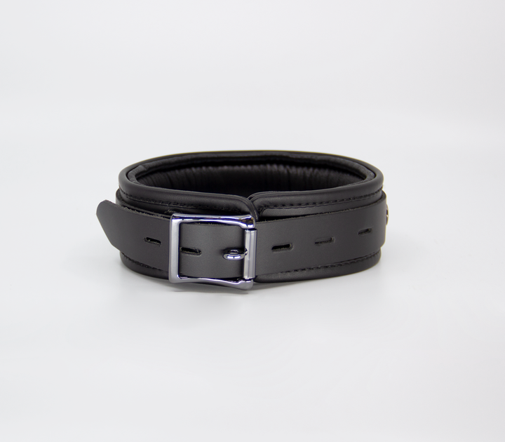 Premium leather collar close-up - showing pewter buckle detail and leather texture