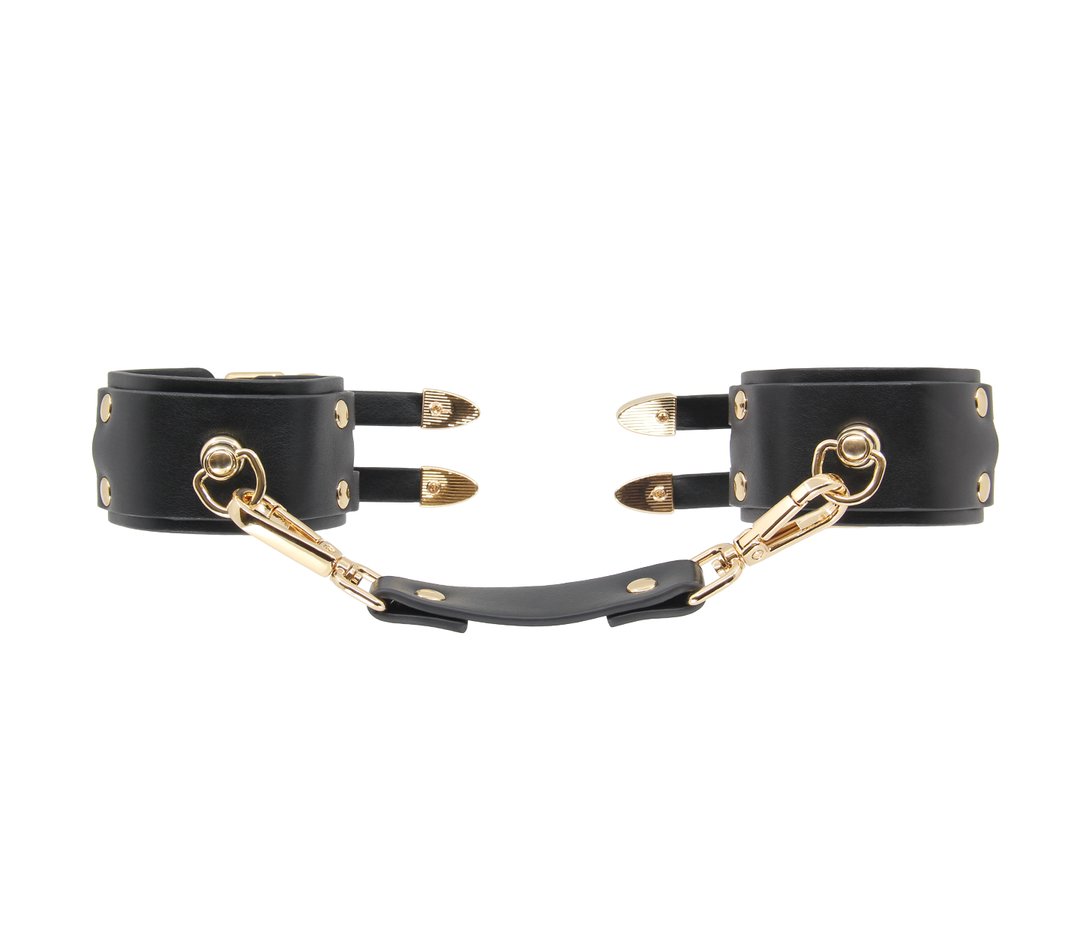 Double strap cuffs in black leather - comfortable BDSM wrist restraints with dual straps