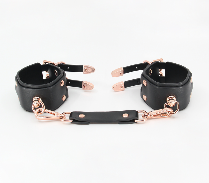 Double strap cuffs with rose gold hardware - elegant BDSM restraints with dual buckles