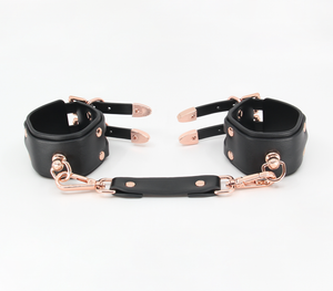 Double strap cuffs with rose gold hardware - elegant BDSM restraints with dual buckles