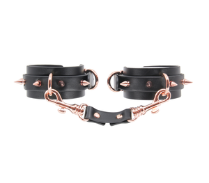Spiked cuffs with rose gold hardware - premium leather fetish restraints with decorative spikes