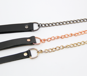 Love in Leather chain lead close-up - showing leather handle and metal chain construction