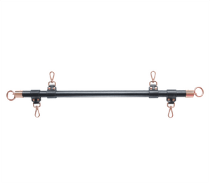 Love in Leather spreader bar detail - showing rose gold hardware and leather wrapping construction